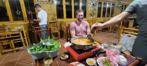 Davis with large meal in Vietnam