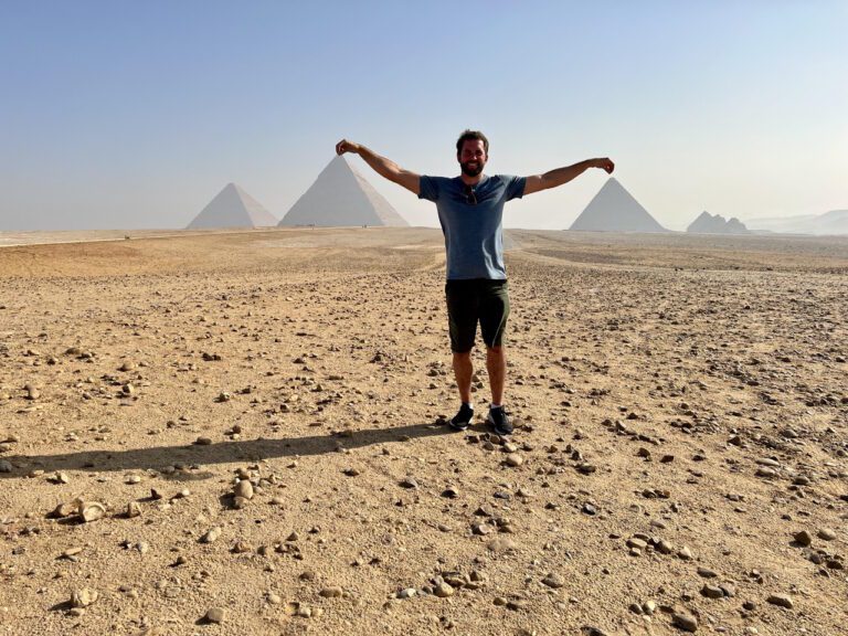 Davis with the great pyramids in the background